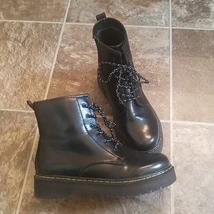 Black Dr. Marten-style platform combat boots